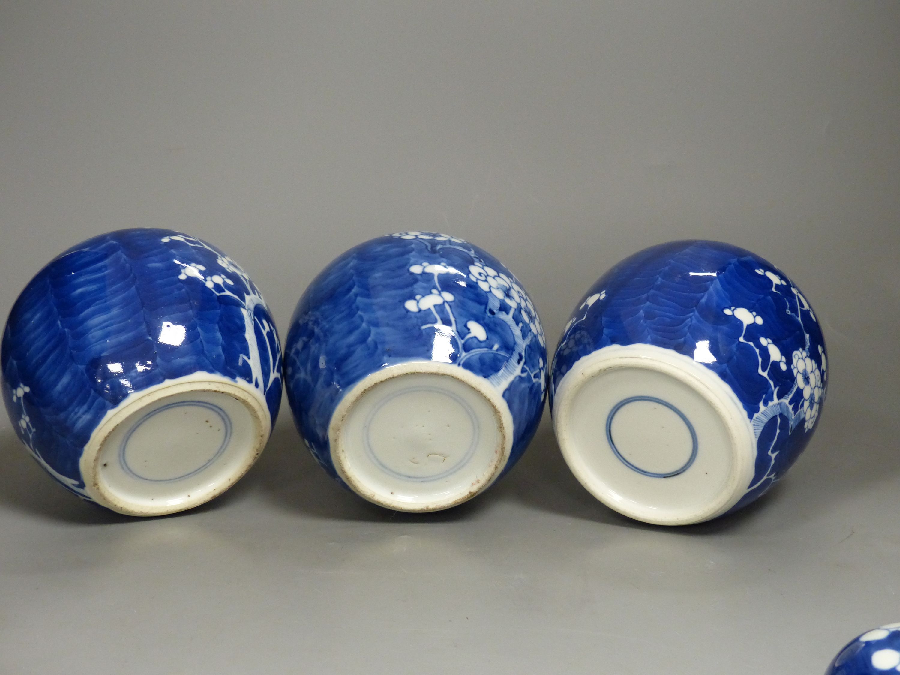 Three Chinese blue and white prunus jars, late 19th century/early 20th century